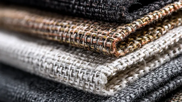 Visual showing cross-section of high-denier fibers in woven bag fabric